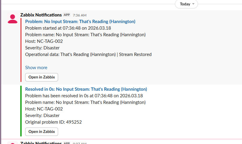 Zabbix alerts in Slack: a lost input stream flagged, then marked resolved.